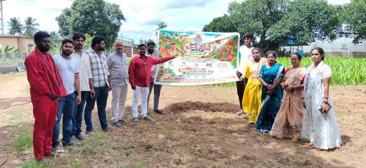 Foundation members holding a banner for the kitchen garden seed kit programme